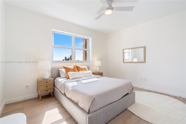 bedroom featuring ceiling fan and light wood-type flooring