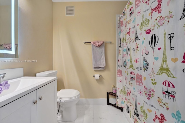 bathroom featuring vanity, curtained shower, and toilet