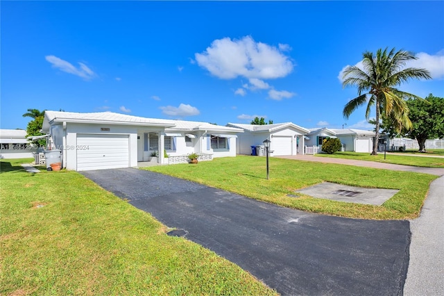 2851 W Golf Blvd, Pompano Beach, FL 33064 - ranch-style home with an attached garage, asphalt driveway, a front lawn, and stucco siding