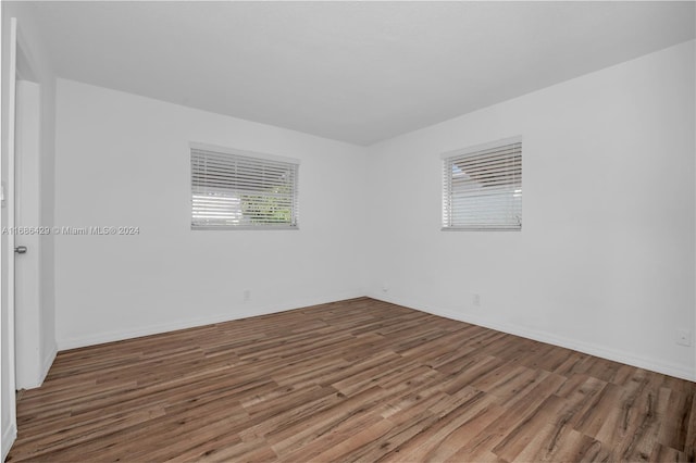 empty room featuring hardwood / wood-style floors