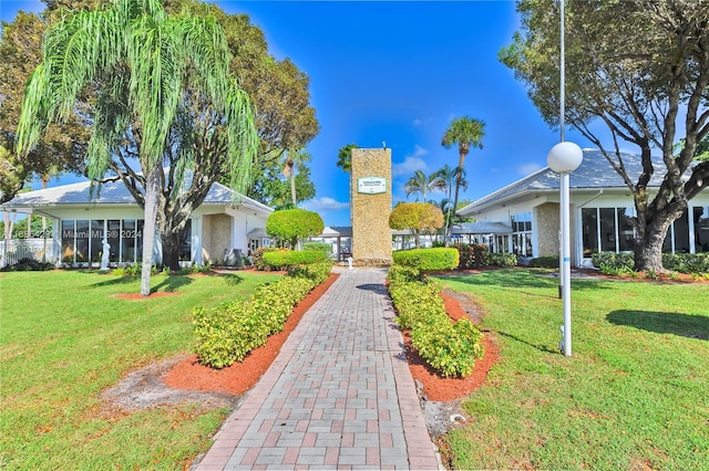 2851 W Golf Blvd, Pompano Beach, FL 33064 - view of property's community with a yard