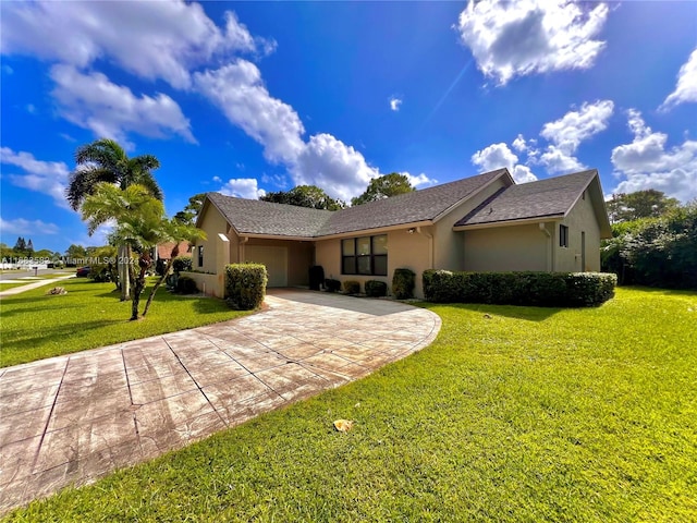 single story home with a front yard