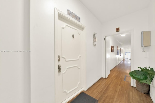 corridor featuring light hardwood / wood-style floors