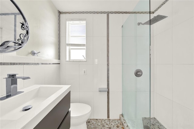 610 8th St Unit 102, Miami Beach, FL 33139 - full bathroom with tile walls, a stall shower, and vanity