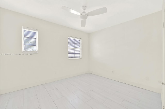 unfurnished room featuring ceiling fan