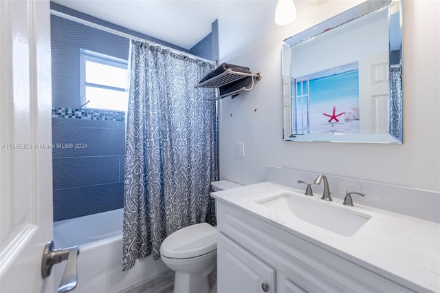 full bathroom featuring vanity, toilet, shower / bath combo, and hardwood / wood-style floors