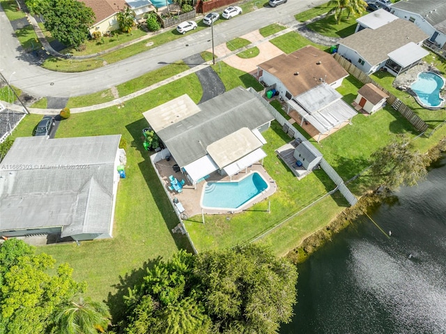 birds eye view of property featuring a water view