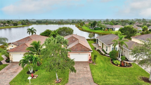 bird's eye view with a water view