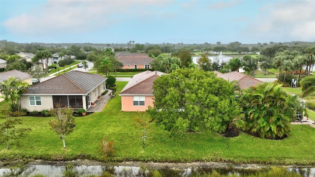 birds eye view of property featuring a water view