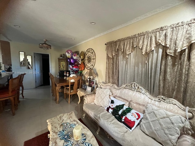 living room featuring crown molding