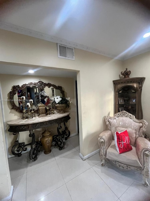 living area featuring tile patterned flooring