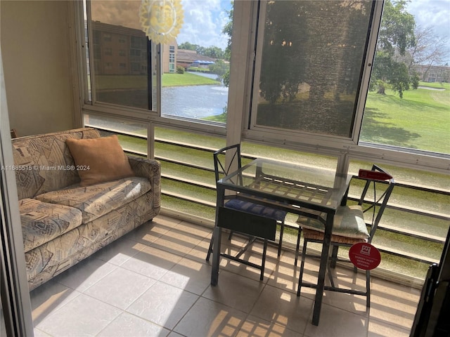 sunroom with a water view