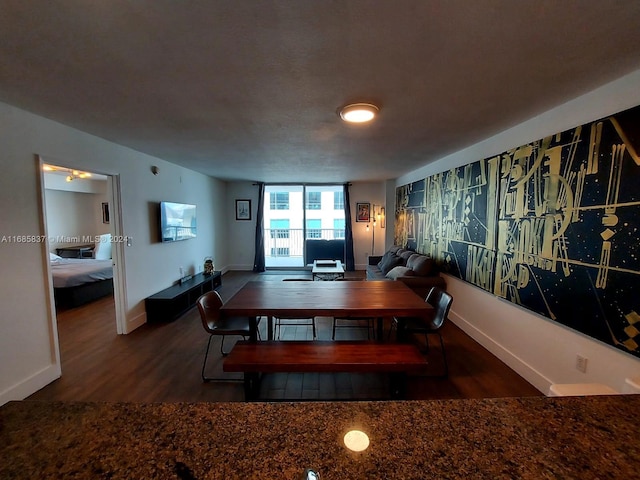 dining room with dark wood-type flooring