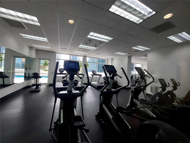 gym featuring a drop ceiling