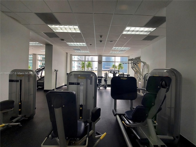 gym featuring a drop ceiling