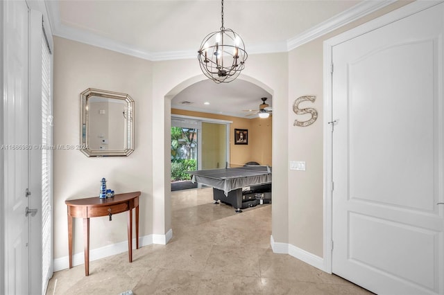 hallway featuring ornamental molding and a notable chandelier