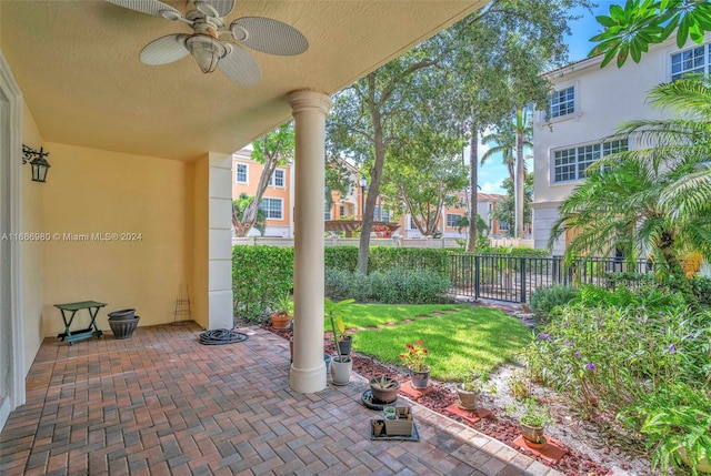 view of patio featuring ceiling fan