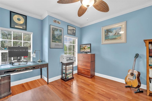 misc room with ornamental molding, hardwood / wood-style flooring, and ceiling fan