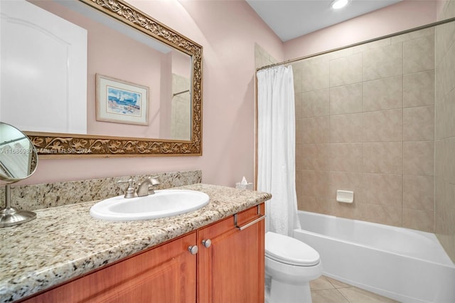 full bathroom featuring toilet, vanity, shower / bath combination with curtain, and tile patterned floors