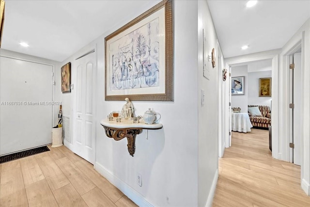 hallway featuring light hardwood / wood-style floors