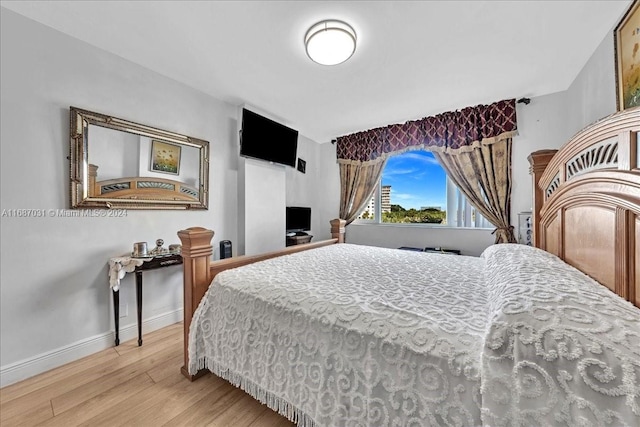 bedroom featuring light hardwood / wood-style flooring