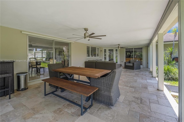 view of patio / terrace featuring outdoor lounge area, french doors, and ceiling fan