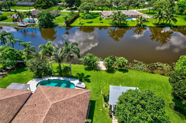 drone / aerial view with a water view