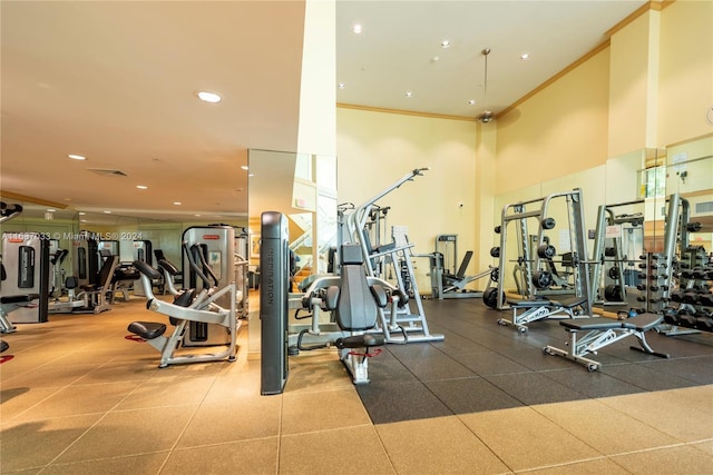 workout area with crown molding