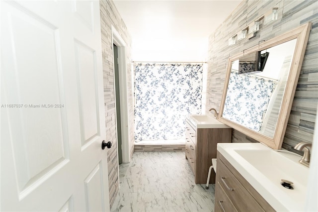 bathroom with vanity and curtained shower