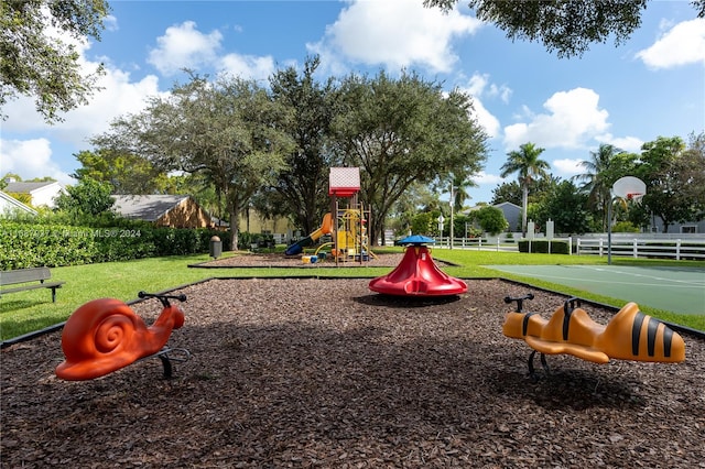 view of playground featuring a yard