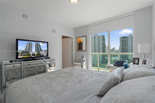 bedroom featuring multiple windows