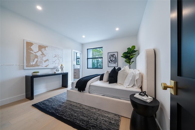 bedroom with light hardwood / wood-style flooring