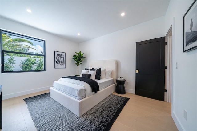 bedroom featuring light hardwood / wood-style flooring