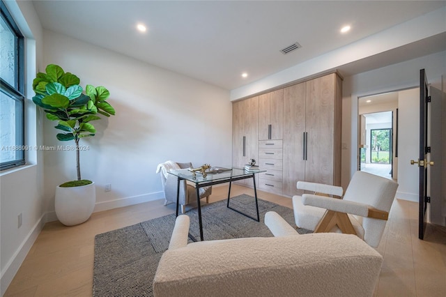 office area with light wood-type flooring