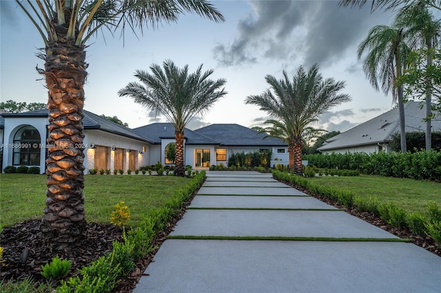 view of front of home with a front yard