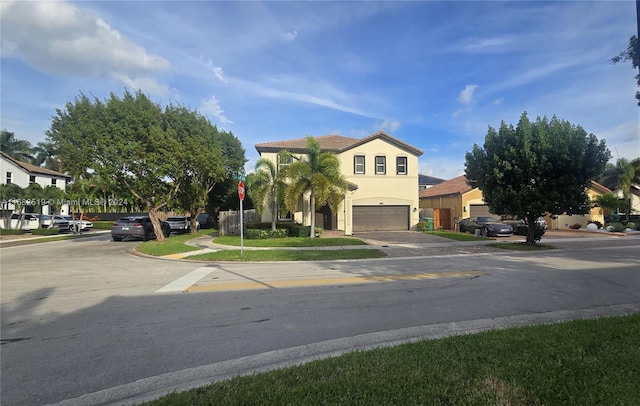 view of front of property with a garage