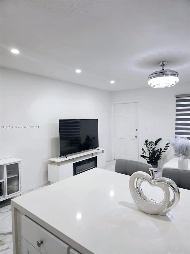 kitchen featuring white cabinetry