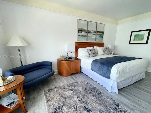 bedroom featuring hardwood / wood-style floors