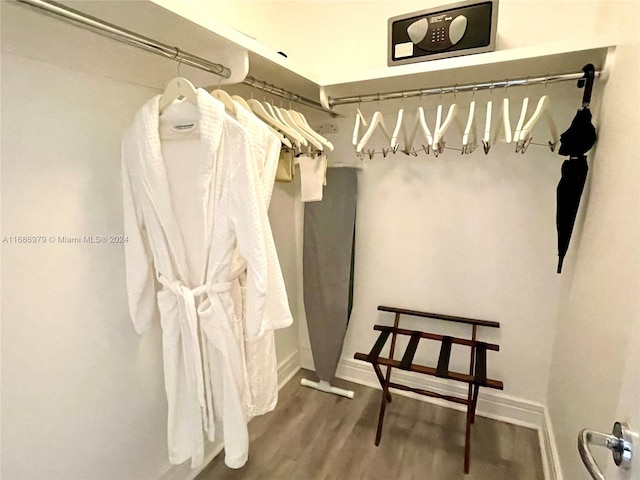 walk in closet featuring hardwood / wood-style floors