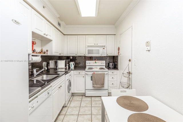 kitchen featuring washer / clothes dryer, white cabinets, ornamental molding, sink, and white appliances