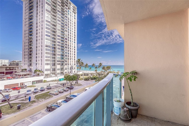 balcony featuring a water view