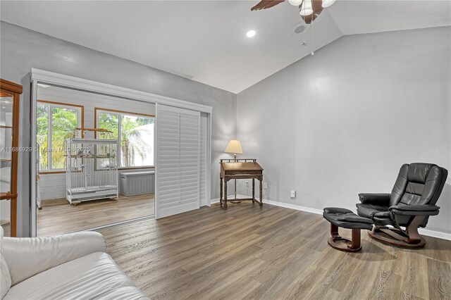 4706 SE Manatee Ter, Stuart, FL 34997 - sitting room with vaulted ceiling, a ceiling fan, wood finished floors, baseboards, and recessed lighting