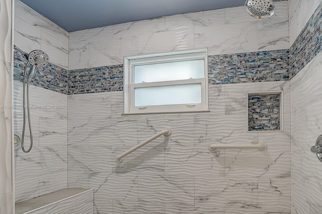 bathroom featuring a tile shower