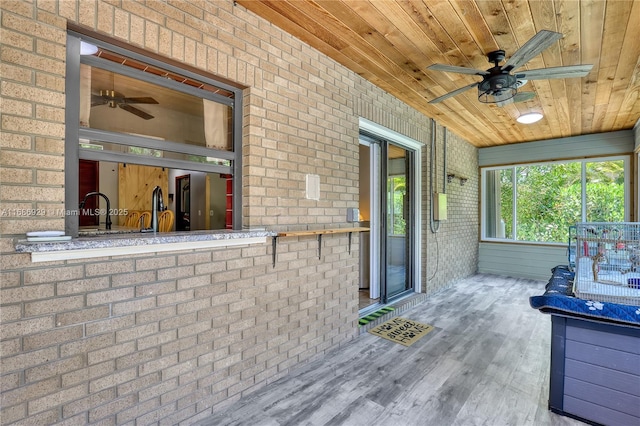 4706 SE Manatee Ter, Stuart, FL 34997 - unfurnished sunroom with ceiling fan