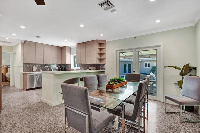 kitchen with sink, backsplash, stainless steel appliances, and light brown cabinets