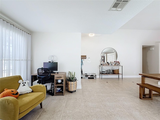 interior space with light tile patterned floors