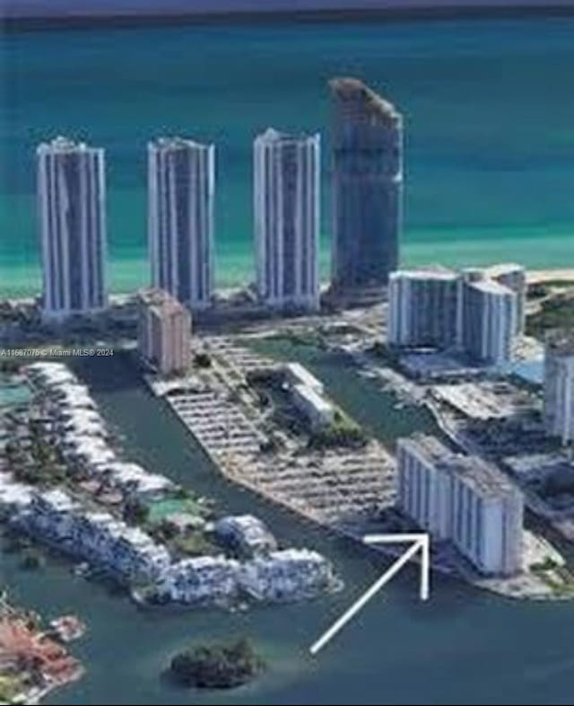 view of home's community with a water view