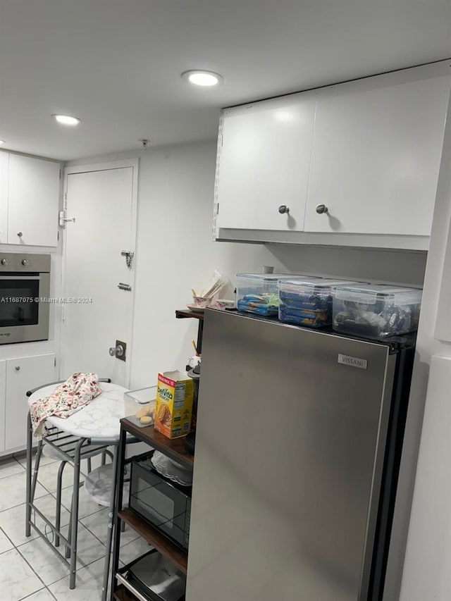 kitchen with white cabinets and stainless steel appliances