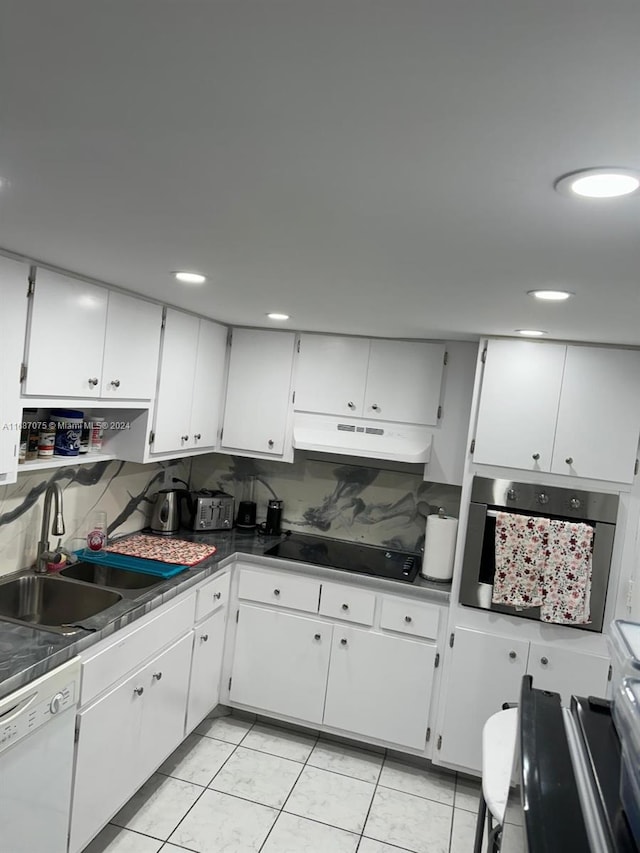 kitchen featuring white cabinetry, sink, white dishwasher, and stainless steel oven