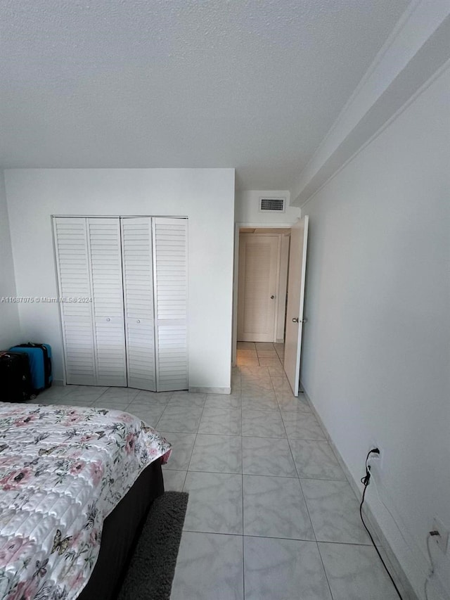 bedroom with a textured ceiling